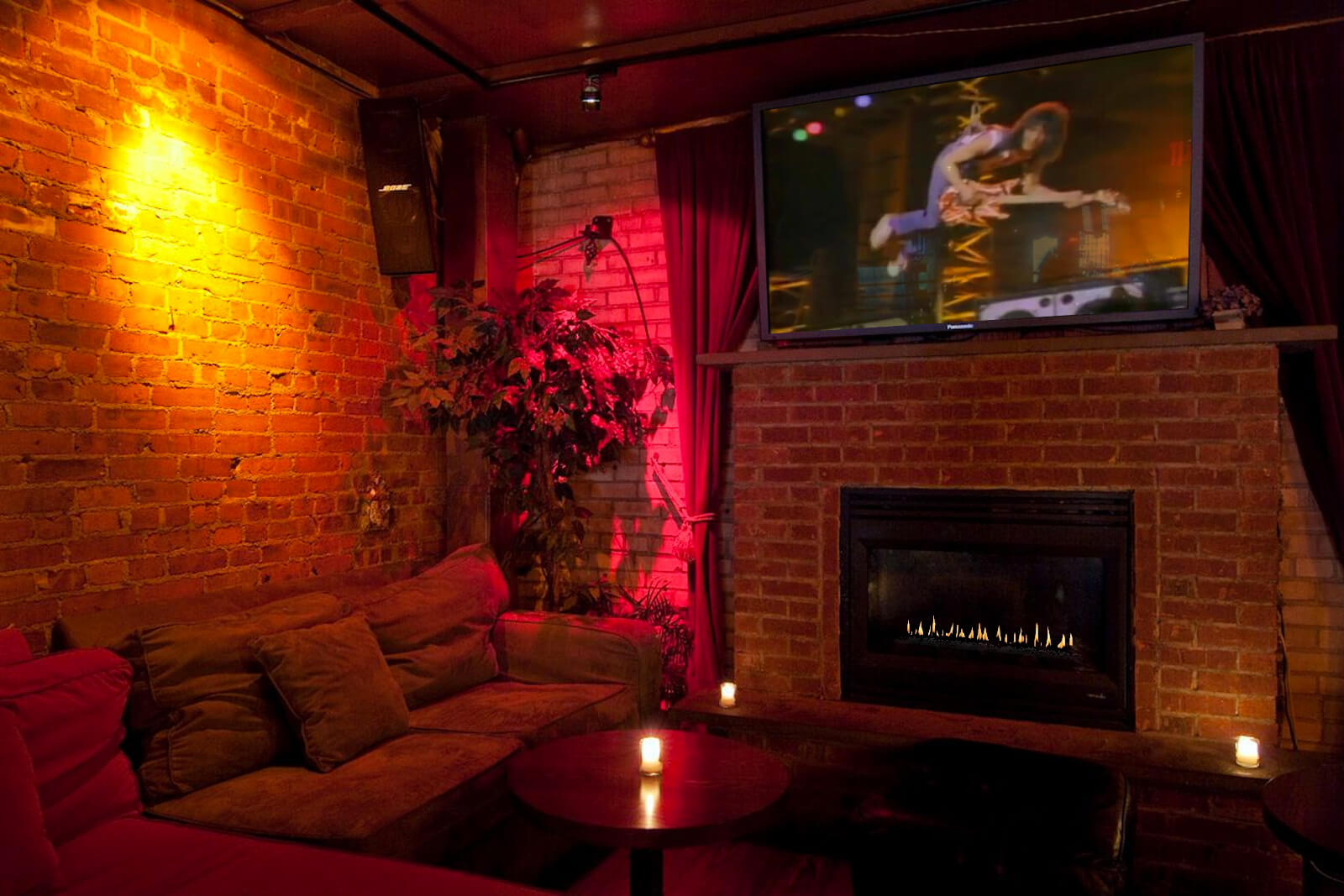 table with tv and fireplace